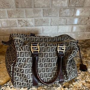 100% authentic Fendi Brown and Black Monogram Bag worn with love